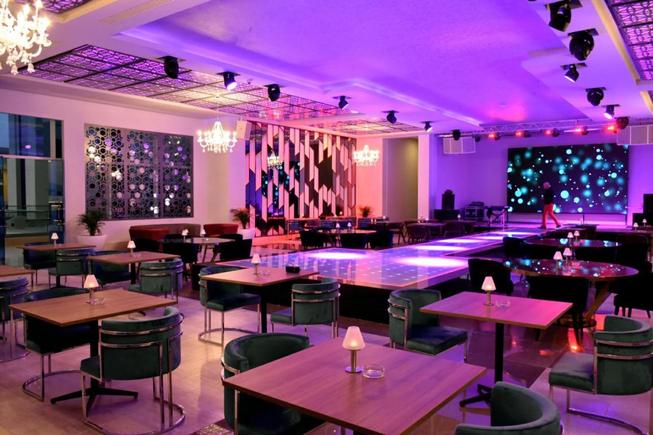 Pickalbatros White Beach Taghazout (Adults Only) Exterior foto The interior of a nightclub in India