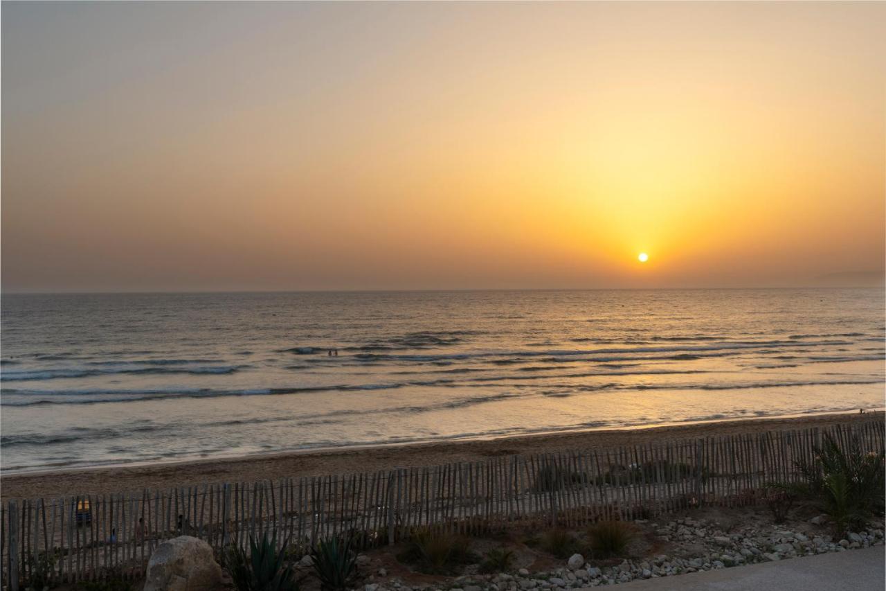 Pickalbatros White Beach Taghazout (Adults Only) Exterior foto Sunset at the beach