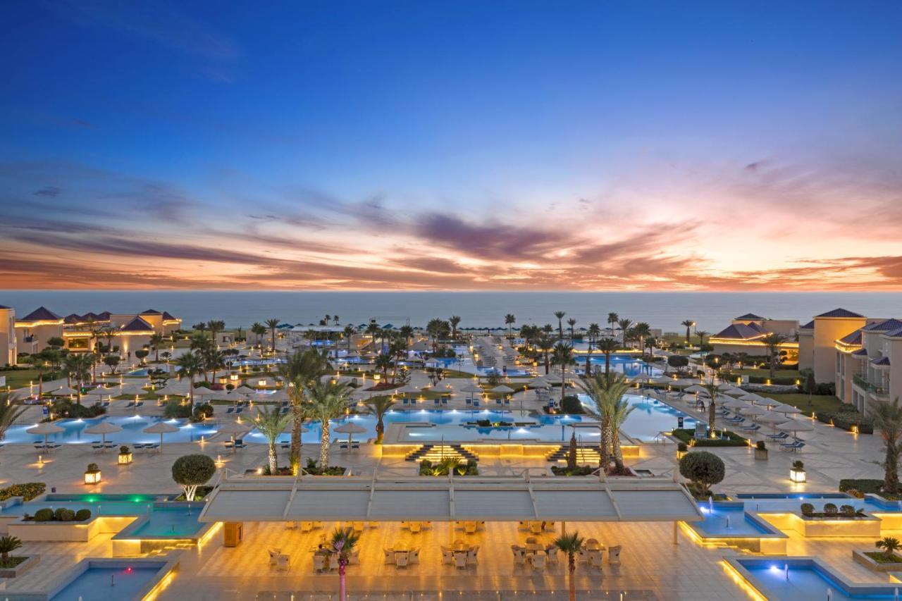 Pickalbatros White Beach Taghazout (Adults Only) Exterior foto The resort at sunset